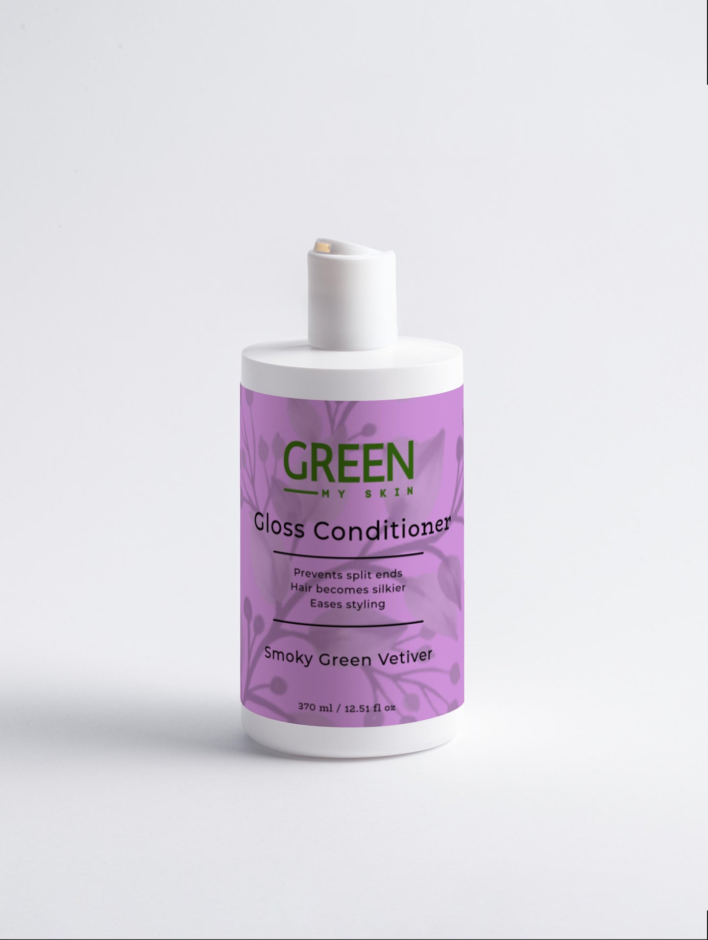 Vegan gloss conditioner with organic, cruelty-free ingredients and a smoky green vetiver fragrance to enhance shine, smoothness, and hydration for all hair types, available at greenmyskin.com.