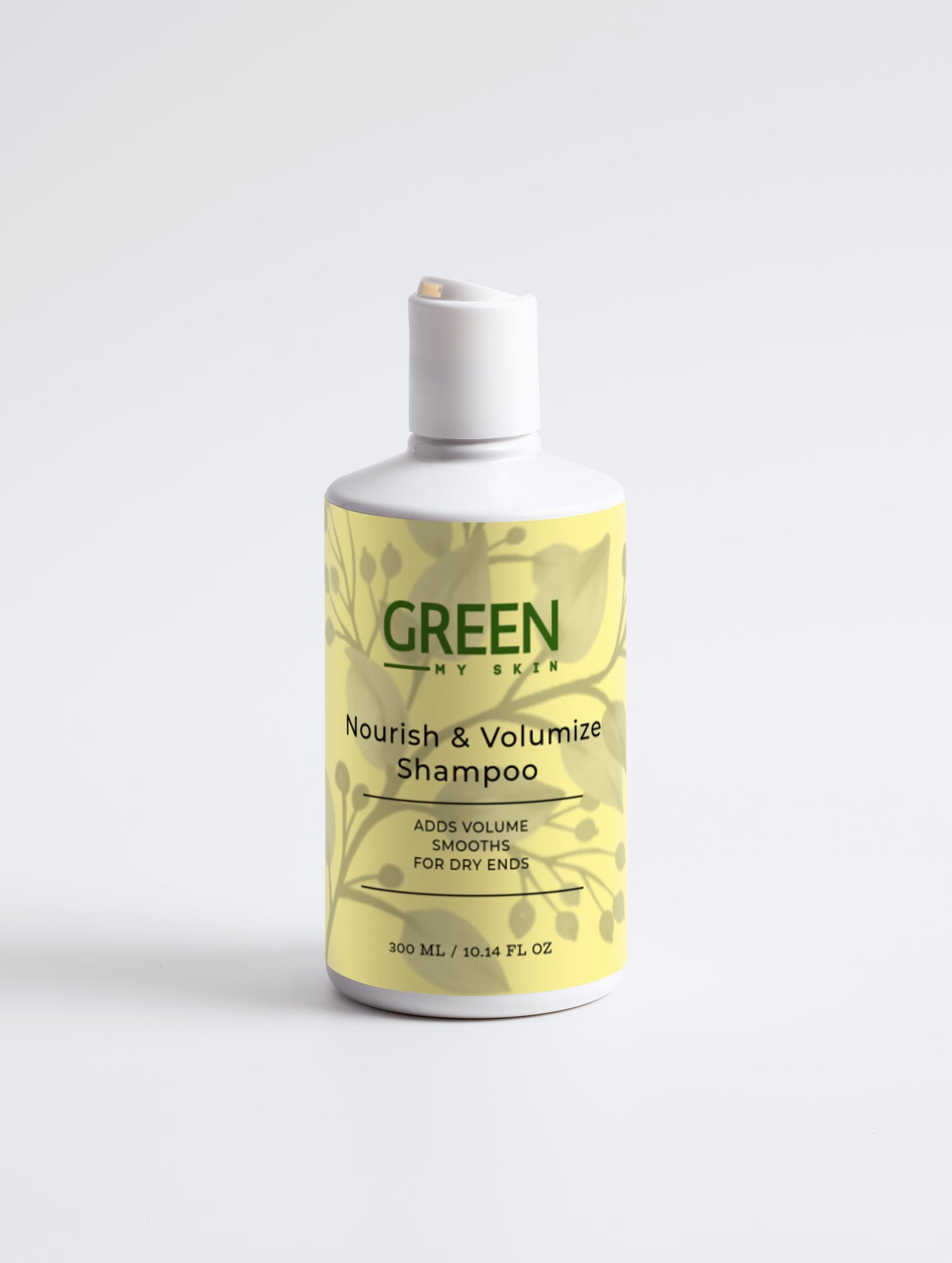 Vegan nourish and volumize shampoo with organic, cruelty-free ingredients to add fullness, strengthen, and hydrate hair, available at greenmyskin.com.